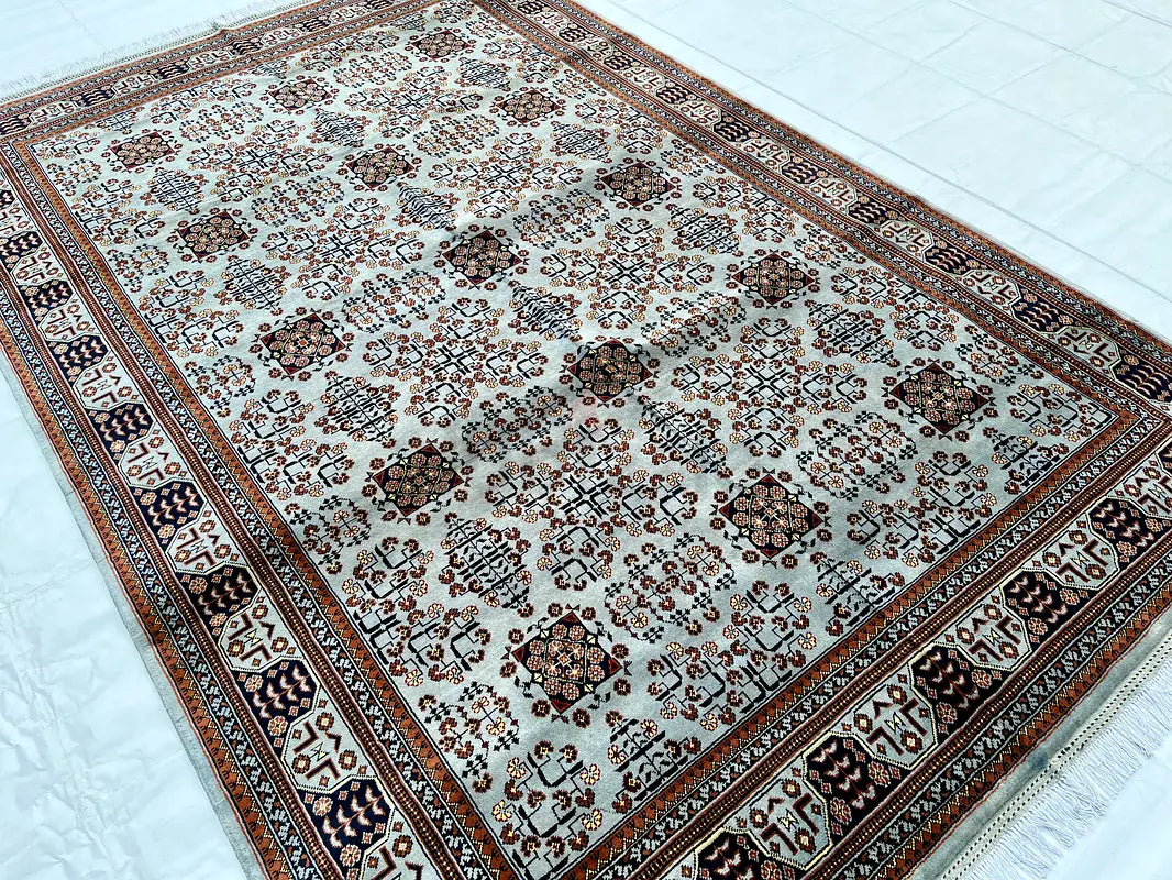 The Alabaster Gul Geometric Tribal Area Rug - Ivory & Mahogany Hand-Knotted Afghan Bokhara Wool Rug