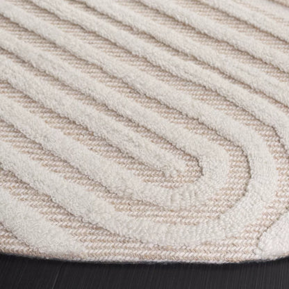 Ivory Hand Tufted Roung Rug - Safavieh-Bisha-Rugs